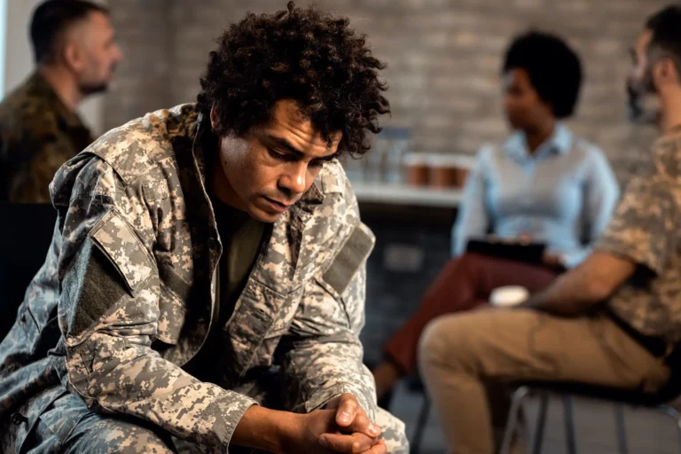 portrait of african-american veteran in support group